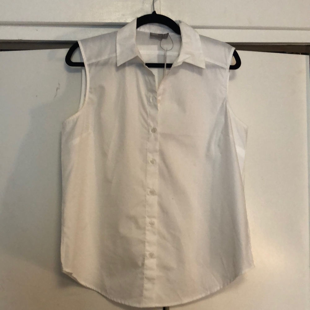 White sleeveless work blouse